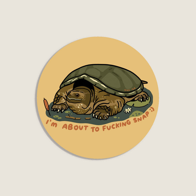 Round sticker with a turtle design and text on a beige background