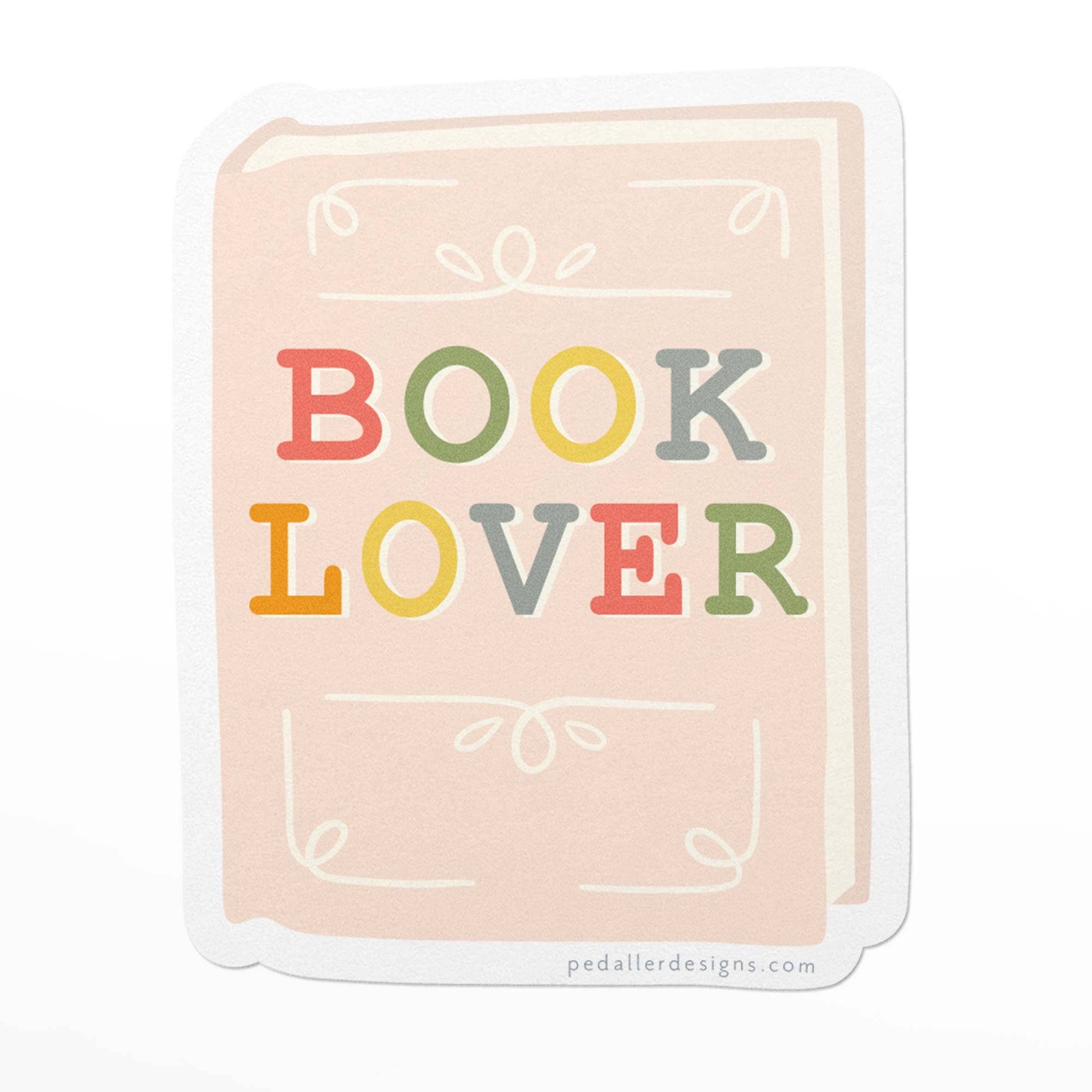 Sticker with 'BOOK LOVER' text in colorful letters on a light pink background