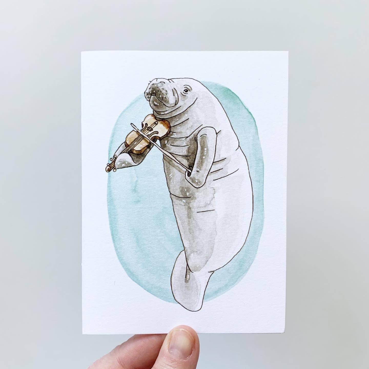 Musical Manatee Greeting Card