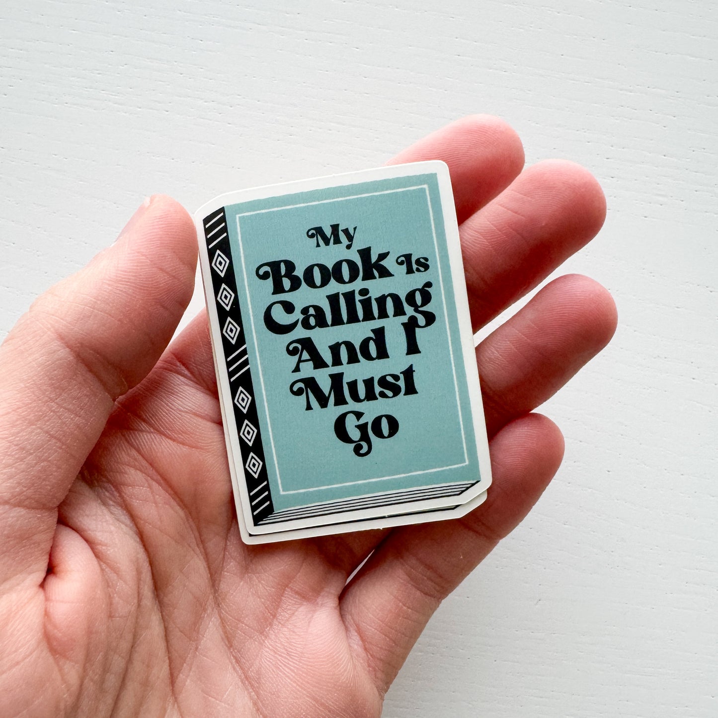 My Book Is Calling Sticker