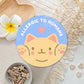 Round sticker with a cat design and text 'Allergic to Humans' on a decorative background.