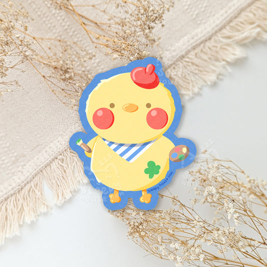 Cartoon chicken character with red cheeks and a blue border on a light background