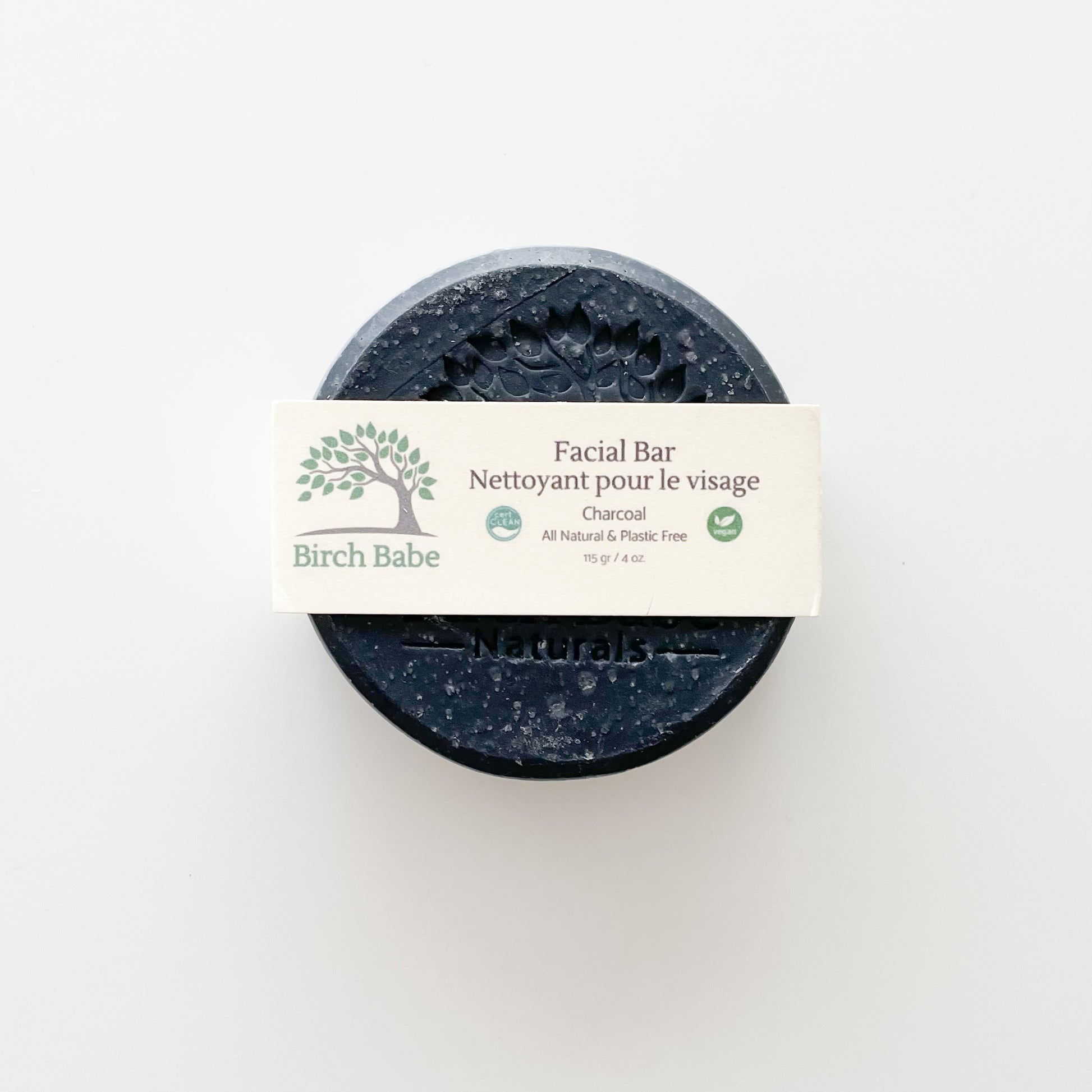 a round charcoal bar of face soap