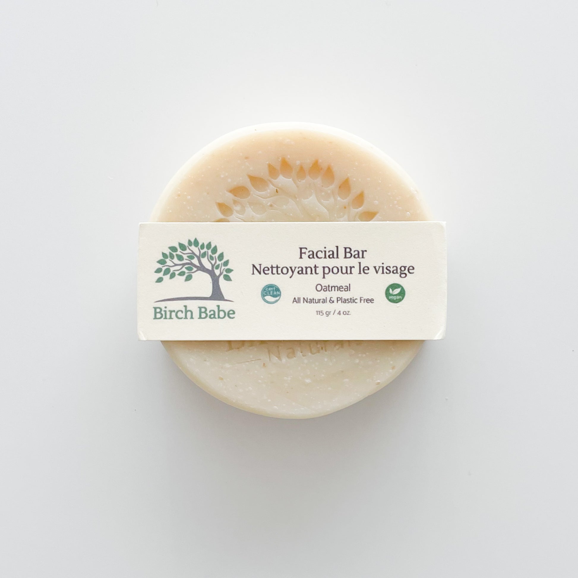 a round bard of off white face soap