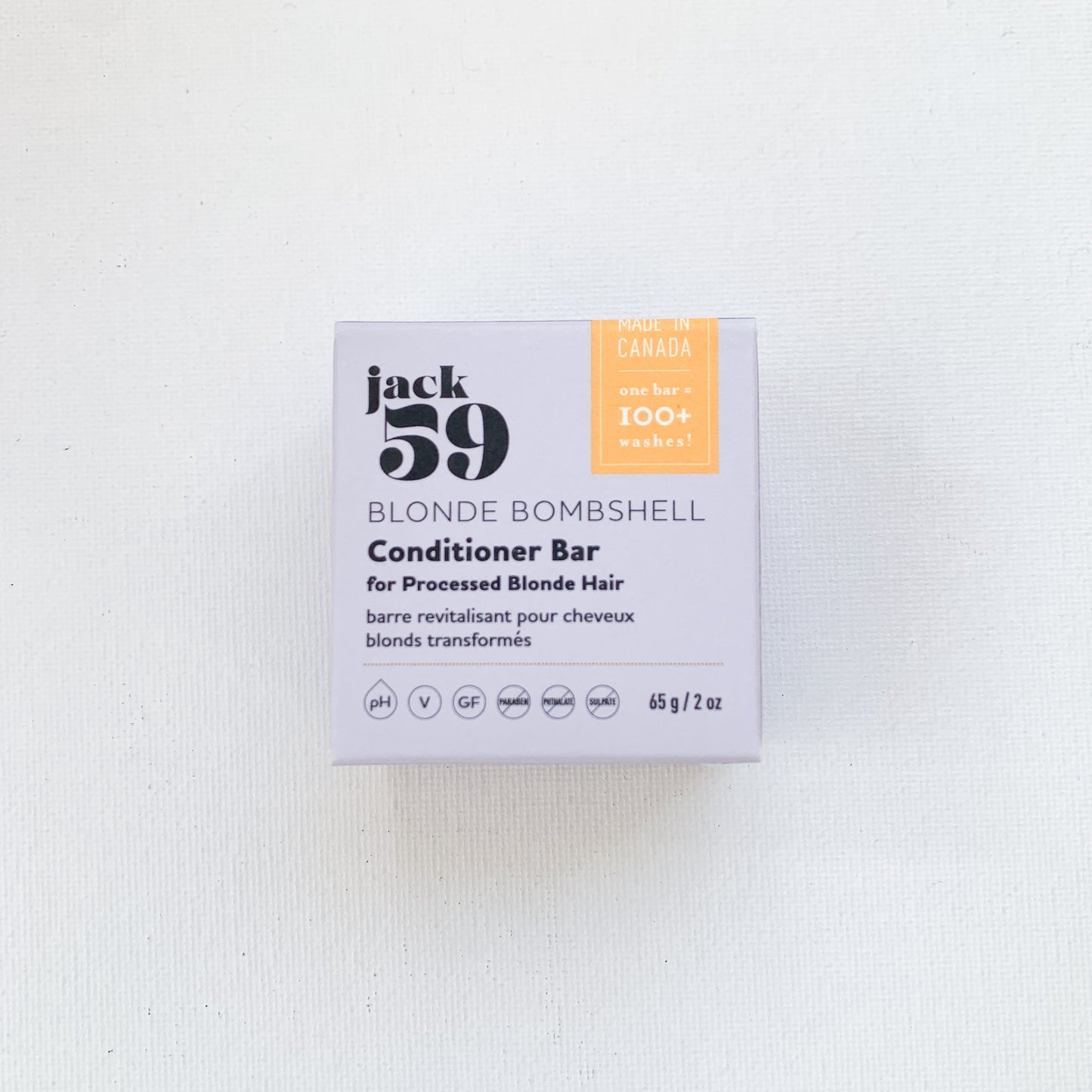 Blonde Bombshell Conditioner bar packaged in a pastel blue box with the text "Jack59 Blonde Bombshell conditioner bar for processed blonde hair'